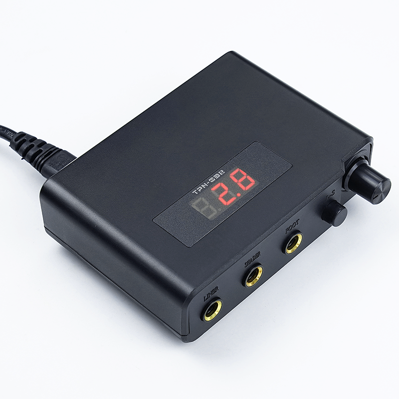 Black Dual Tattoo Power Supply TPN032 displaying voltage 2.8 with power input and adjustable voltage for tattoo machines