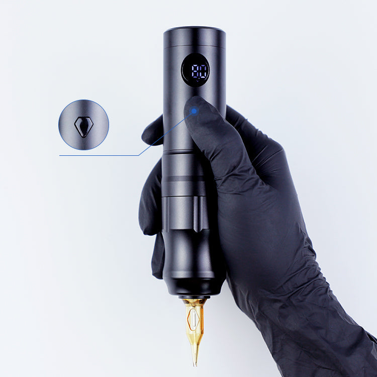 Black Thunderlord Power K6016 Wireless Tattoo Pen held by a gloved hand, with digital display and needle cartridge.