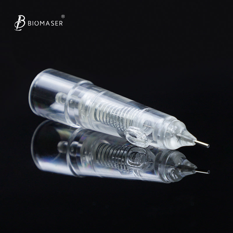 Biomaser 1R Cartridge Needle for PMU. Stainless steel tip and clear casing, professional tattoo equipment.