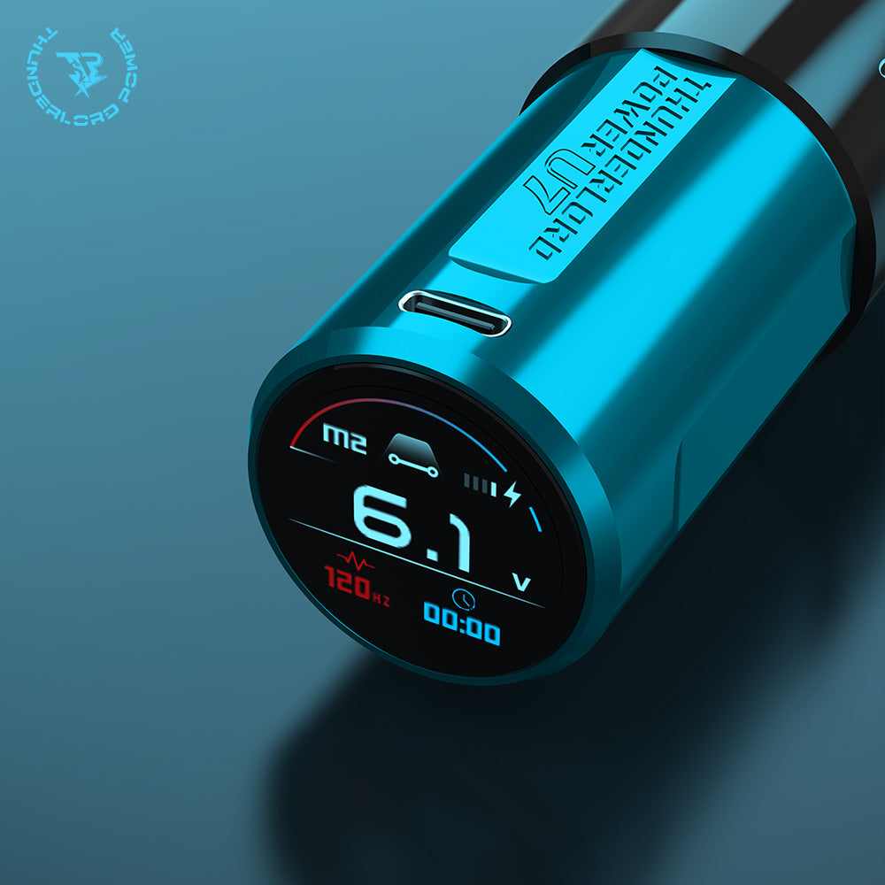 Thunderlord Power U7 wireless tattoo machine pen, teal, digital display showing voltage and frequency