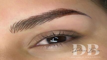Professional Ombre Brows with natural gradient effect.